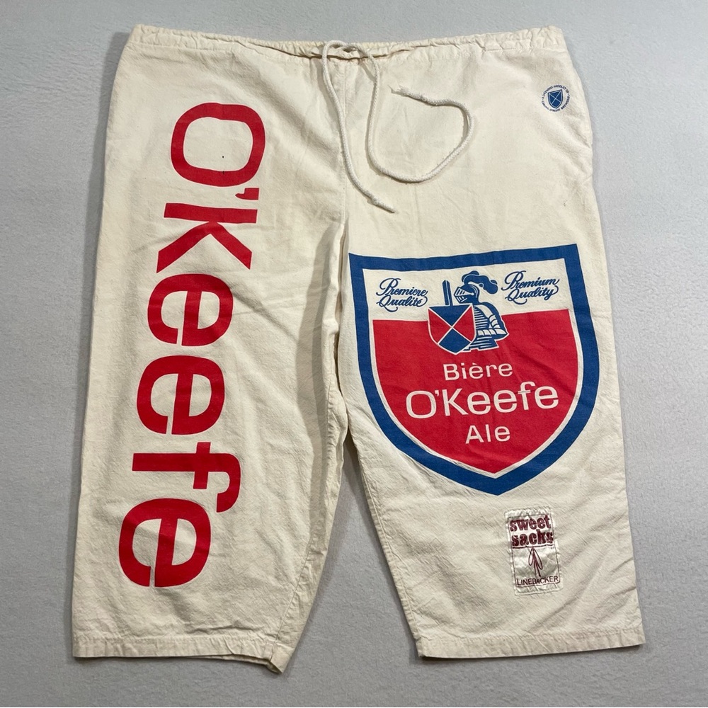 Vintage Sweet Sacks Linebacker O’Keefe Ale Shorts Unisex One Size